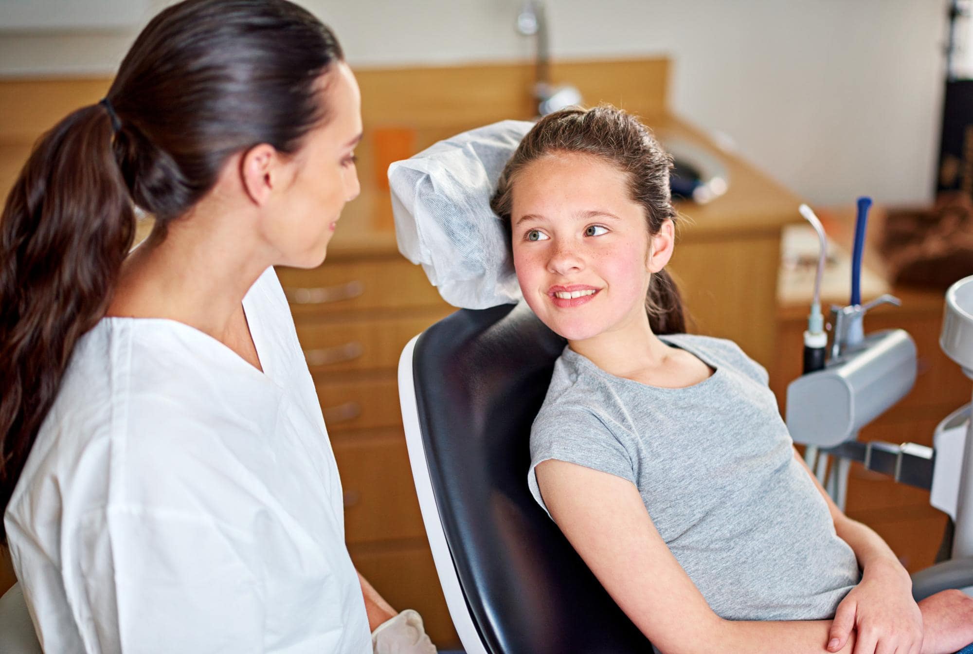 Orthodontist explaining airway anatomy to a teenage patient